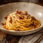 Authentic Spaghetti Carbonara Recipe (No Cream, No Stress) 9 Spaghetti Carbonara Recipe served with crispy beef bacon, creamy cheese sauce, and freshly cracked black pepper.
